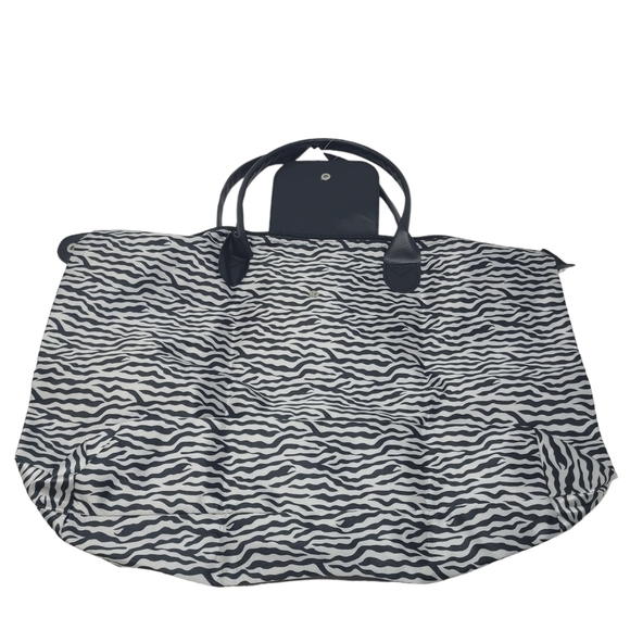 Ashley Stewart | Women's Three-in-One Animal Print Small Handbag to Tote Bag - Picture 8 of 8